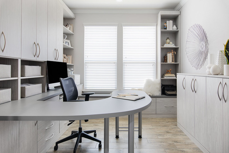 Built-in desk and storage system ffor custom home office space.